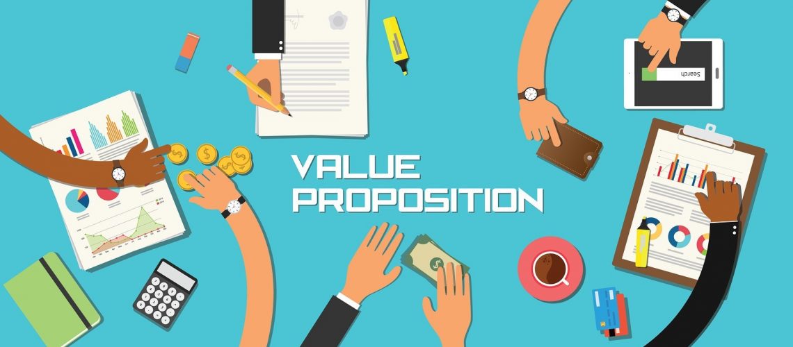 value proposition concept team work business marketing together with hand and table